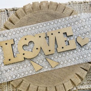 wood shelf sitter love letters and heart with holes to make a marquee sign