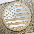 Fire fighter wood shape with a metal overlay that is easy to paint for a hanger for crafting and diy projects