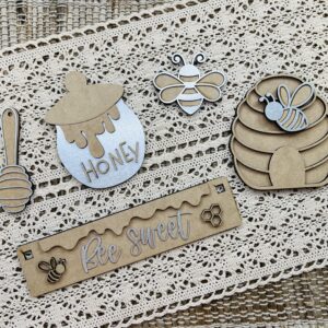 this is a bee metal and wood cutout set that includes metal and wood embellishments