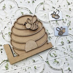 This is a beehive cutout set with a piece of metal for the magnet plate. this craft is to be used with the interchangeable truck